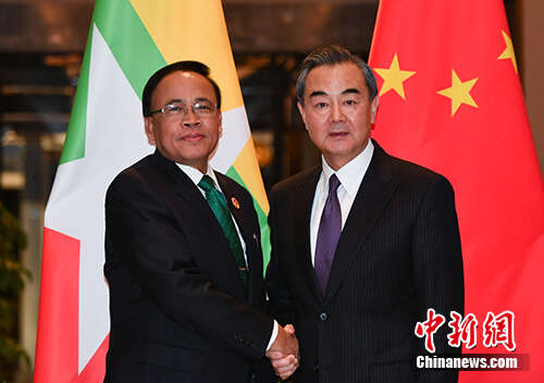 王毅会见缅甸国际合作部长觉丁