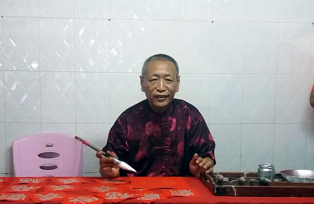 缅华书画协会同道腊月二十九日在仰光唐人街写福送福迎接己亥春节