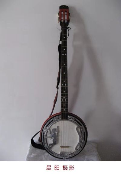 七绝•班卓琴（晨阳、苏文银、舒云、林郁文）