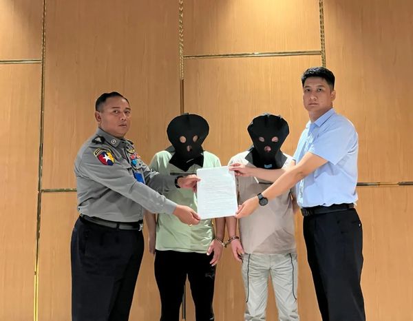 2名在缅电诈嫌疑人被押解回国